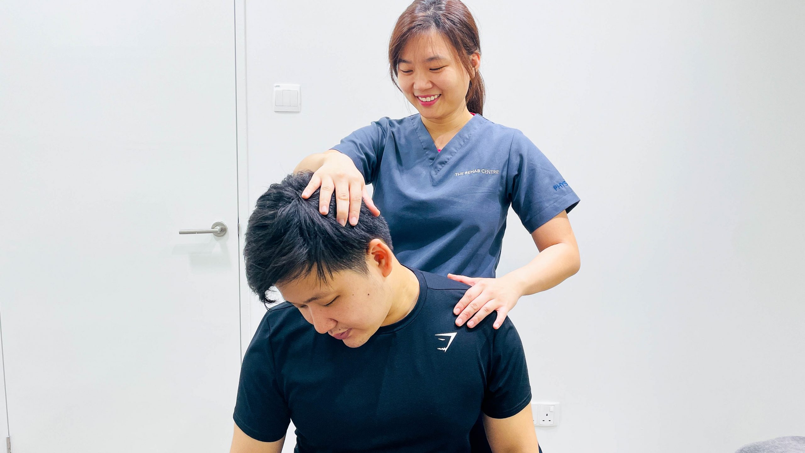 Neck stretch in sitting for neck pain Neck stretch in sitting for neck pain